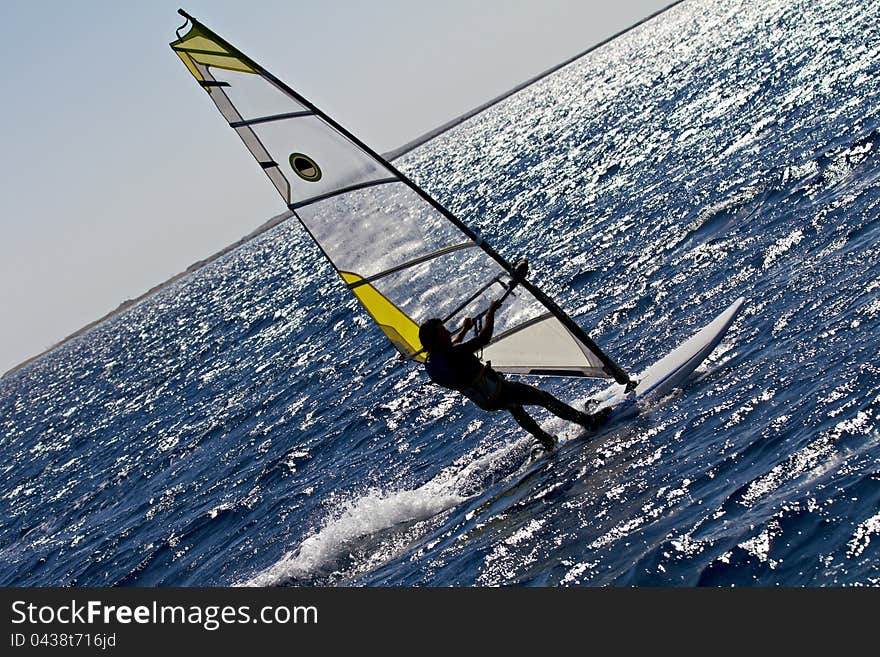 Silhouette Of A Windsurfer