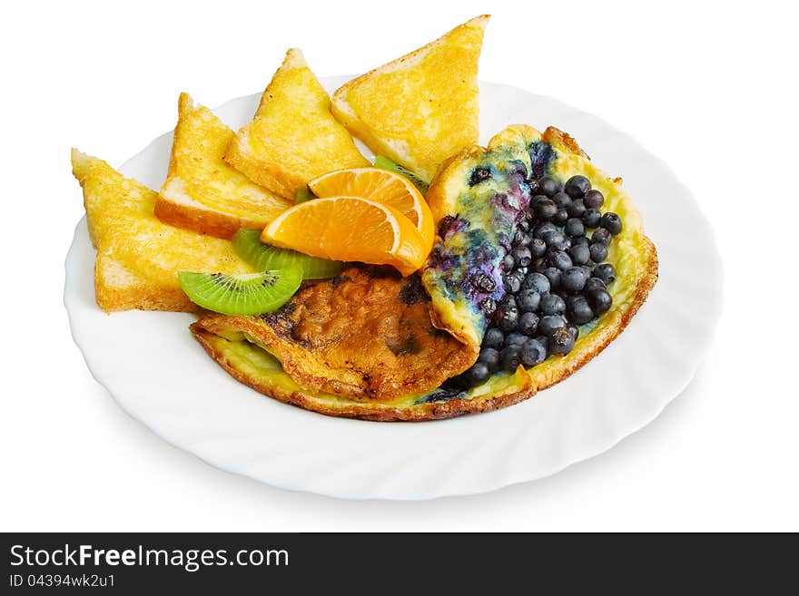 Omelets with blueberries, toast with cheese, slices of oranges and kiwi fruit on a plate, on white