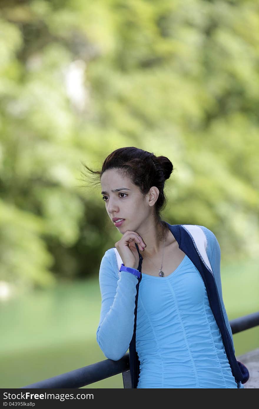 A young tourist on green background