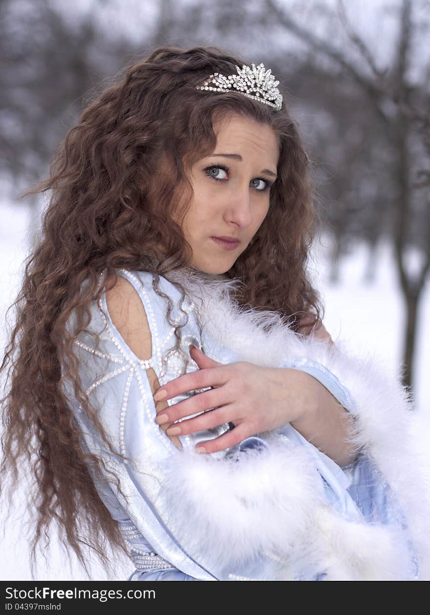 Frozen girl dressed as Snow Maiden cold winter. Frozen girl dressed as Snow Maiden cold winter