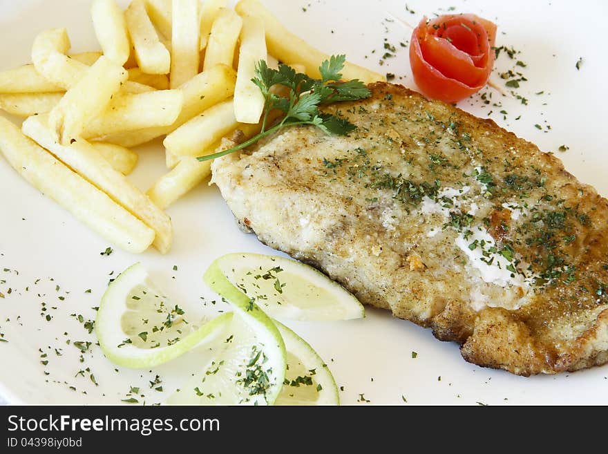 Plate of gourmet hake fish and chips