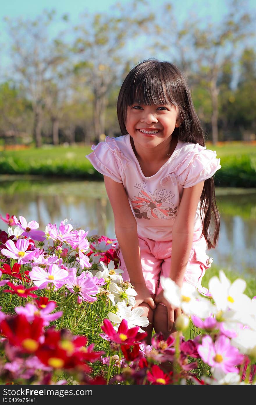 Little girl with Flowers field