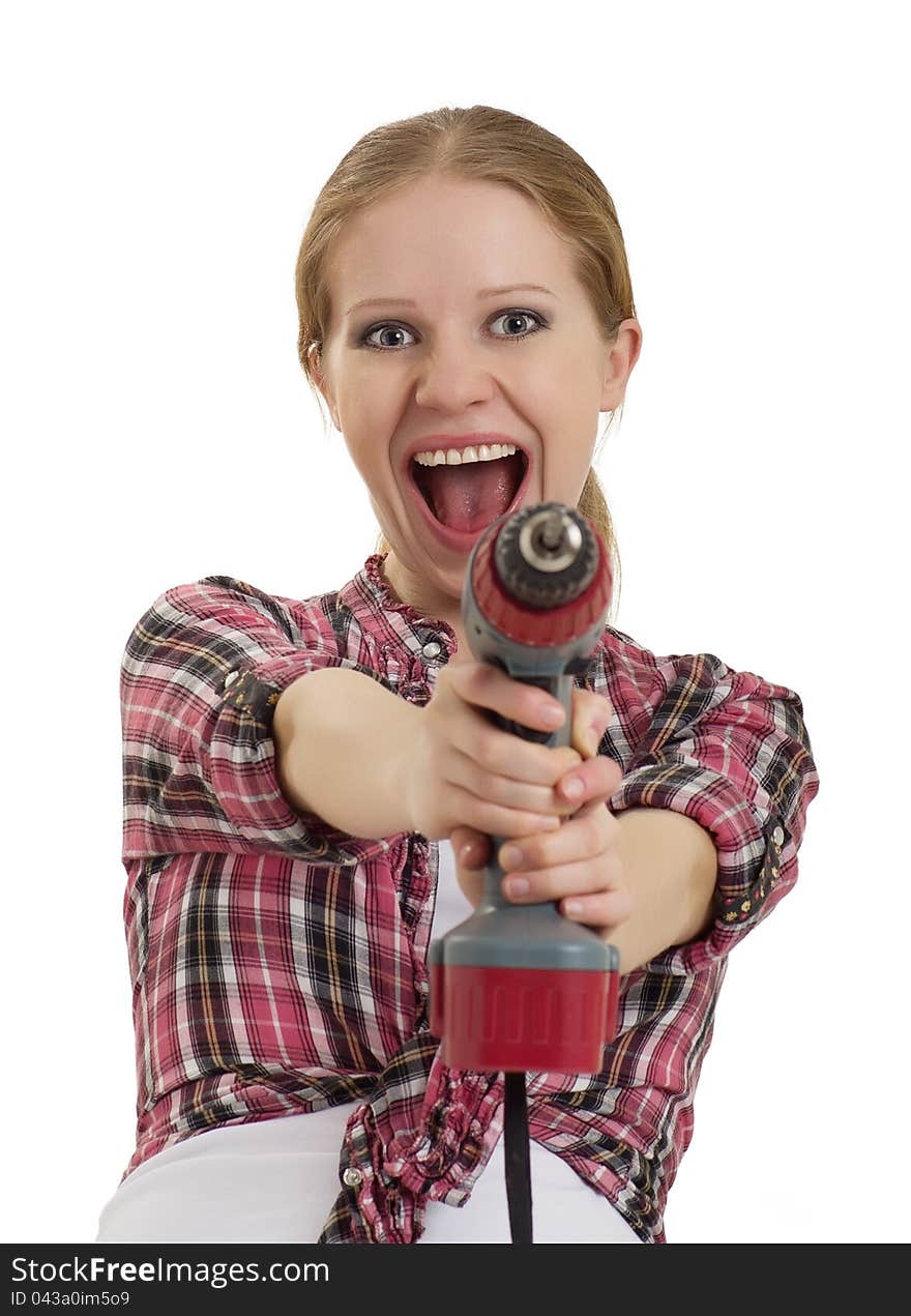 Cheerful girl with cordless drill isolated on white background