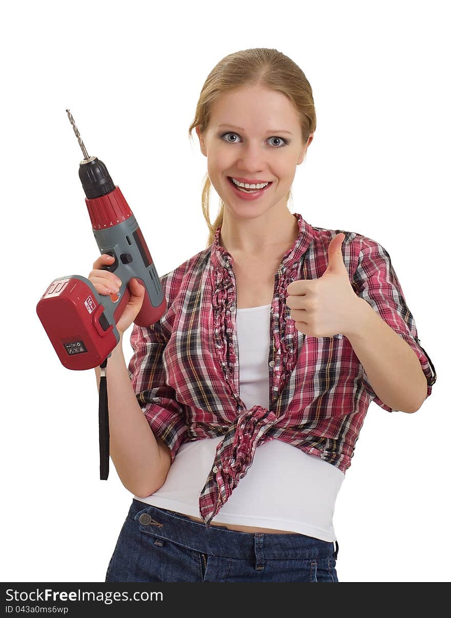 Young cheerful woman with rechargeable drill shows thumb up isolated on white background. Young cheerful woman with rechargeable drill shows thumb up isolated on white background