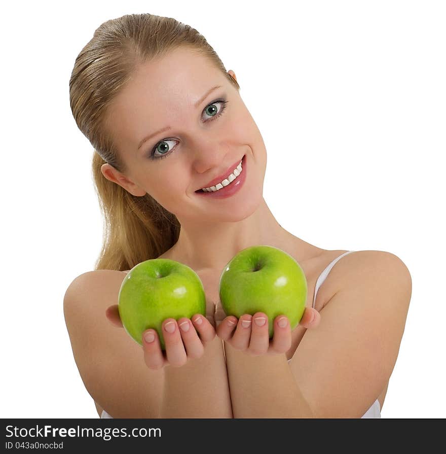 Beautiful healthy girl holding a two green apple isolated on white background