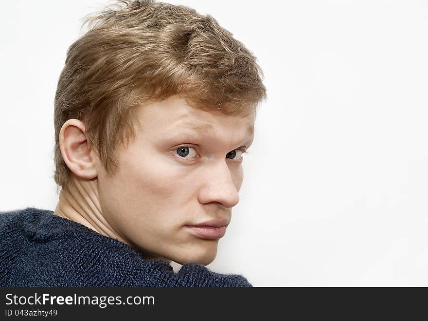 Portrait of the guy on the white background