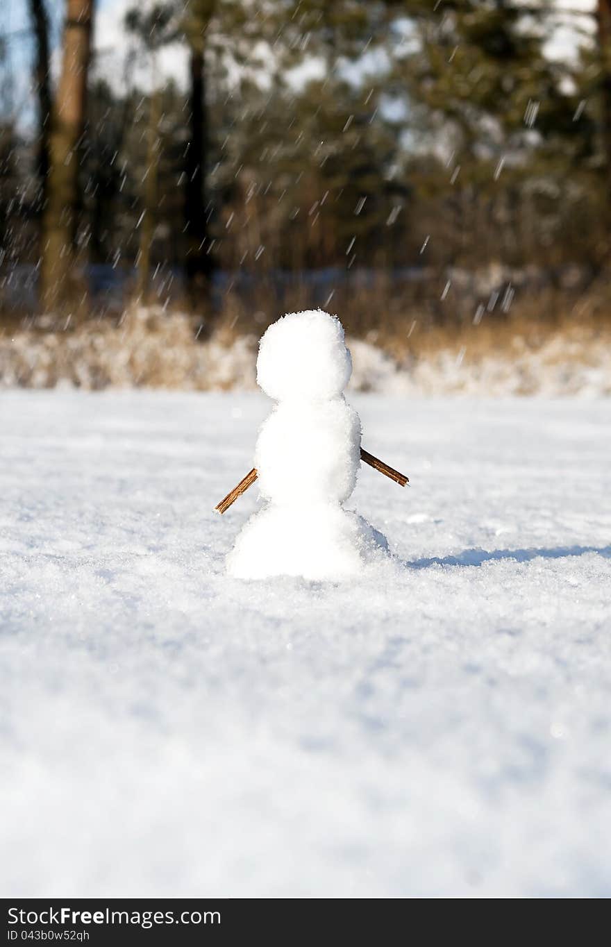 Snowman sculpted in winter