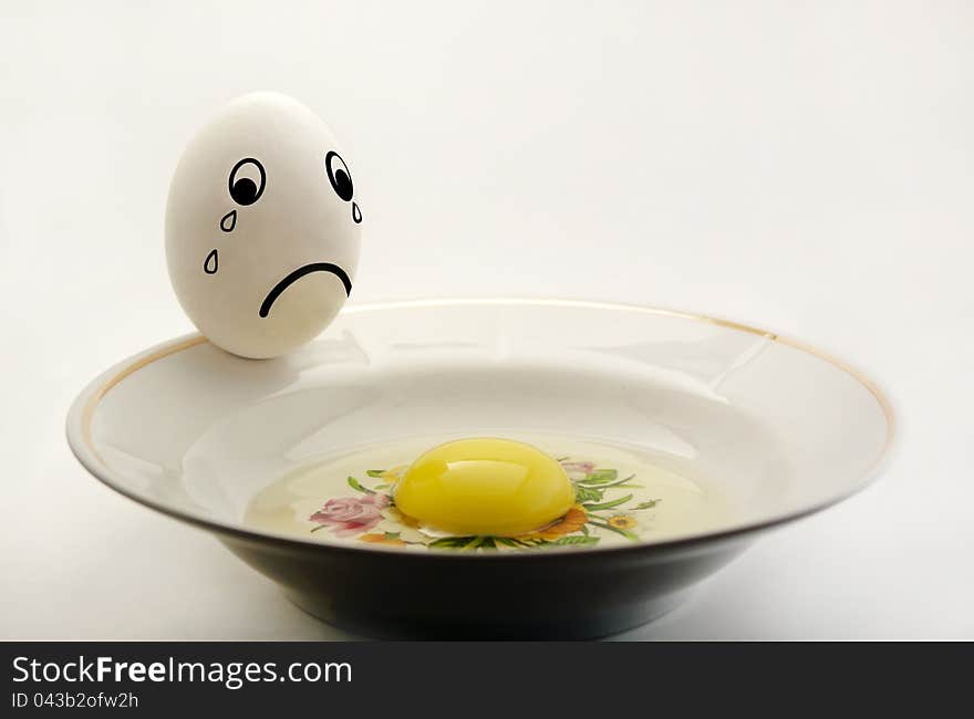 On a white background eggs on a plate