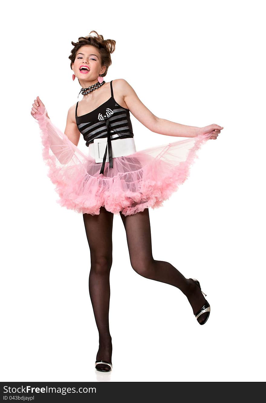 Portrait of beautiful full length teen girl dancing emotionally in the studio on a white background. Portrait of beautiful full length teen girl dancing emotionally in the studio on a white background