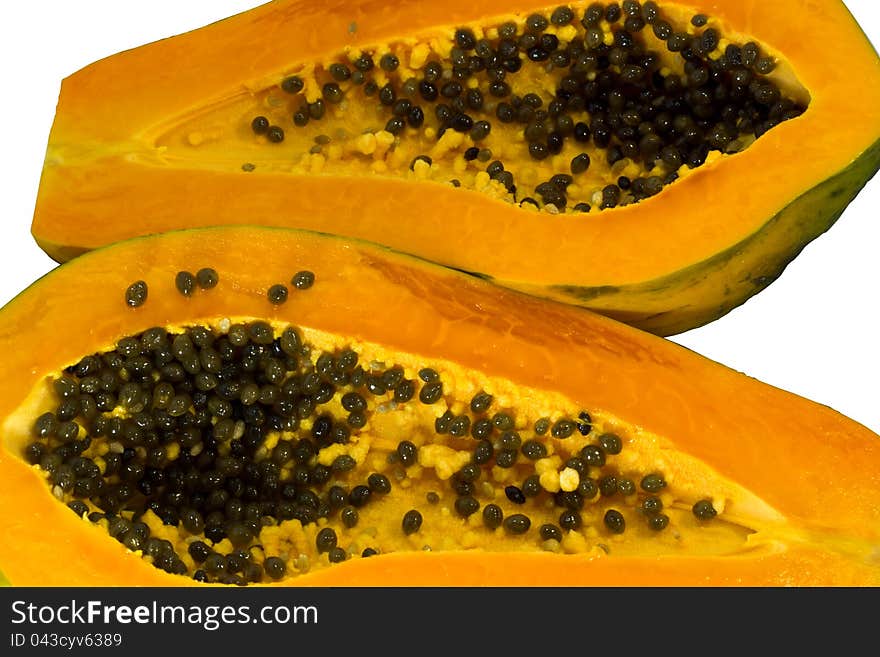 Papaya, cut two hemispheres.