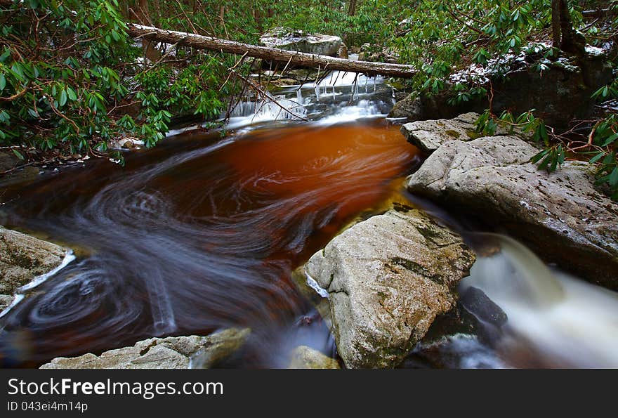 Natural Tannin Colored Stream In The Mountains