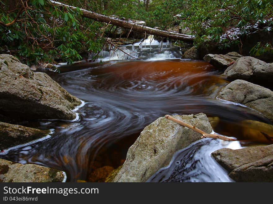 Natural Tannin Colored Stream In The Mountains