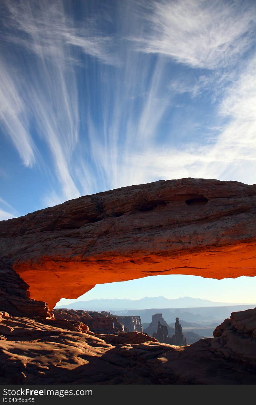 Mesa arch glowing red at sunrise in canyonlands national park. Mesa arch glowing red at sunrise in canyonlands national park