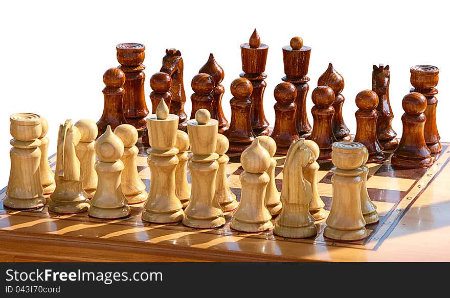 Isolated  chessset figurines on playing board