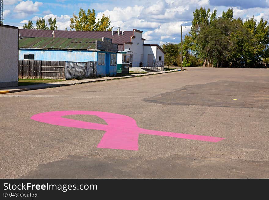 Cereal, Alberta, Canada. The little town with heart. A pink ribbon for breast cancer is painted in the center of main street in this quiet, rustic small prairie town.