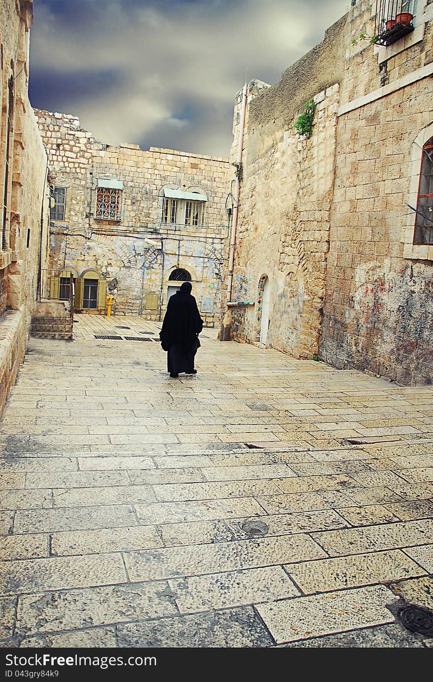 Alone going to a Muslim saint of the ancient streets of Jerusalem. Alone going to a Muslim saint of the ancient streets of Jerusalem