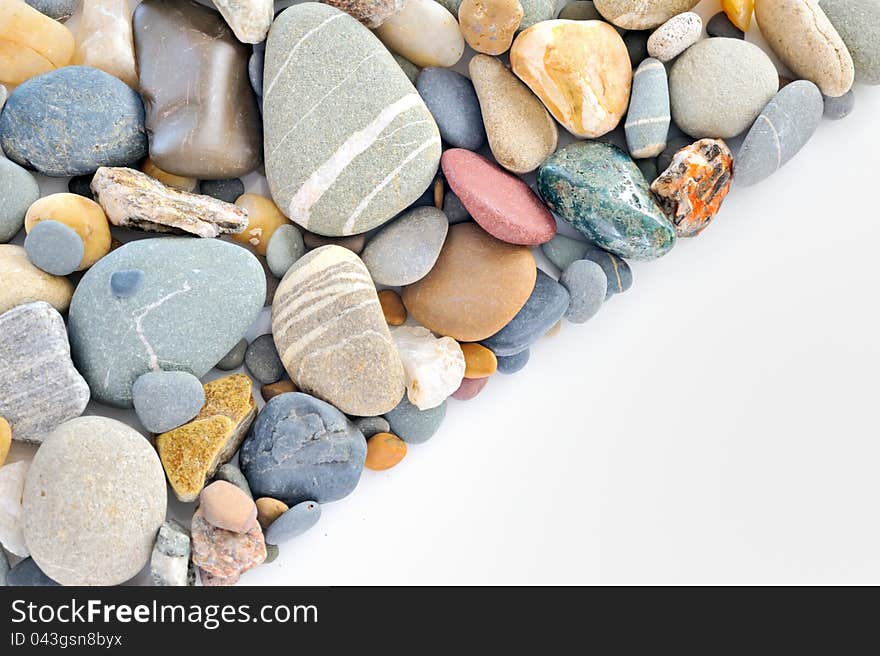 A pile of pebbles isolated on white background