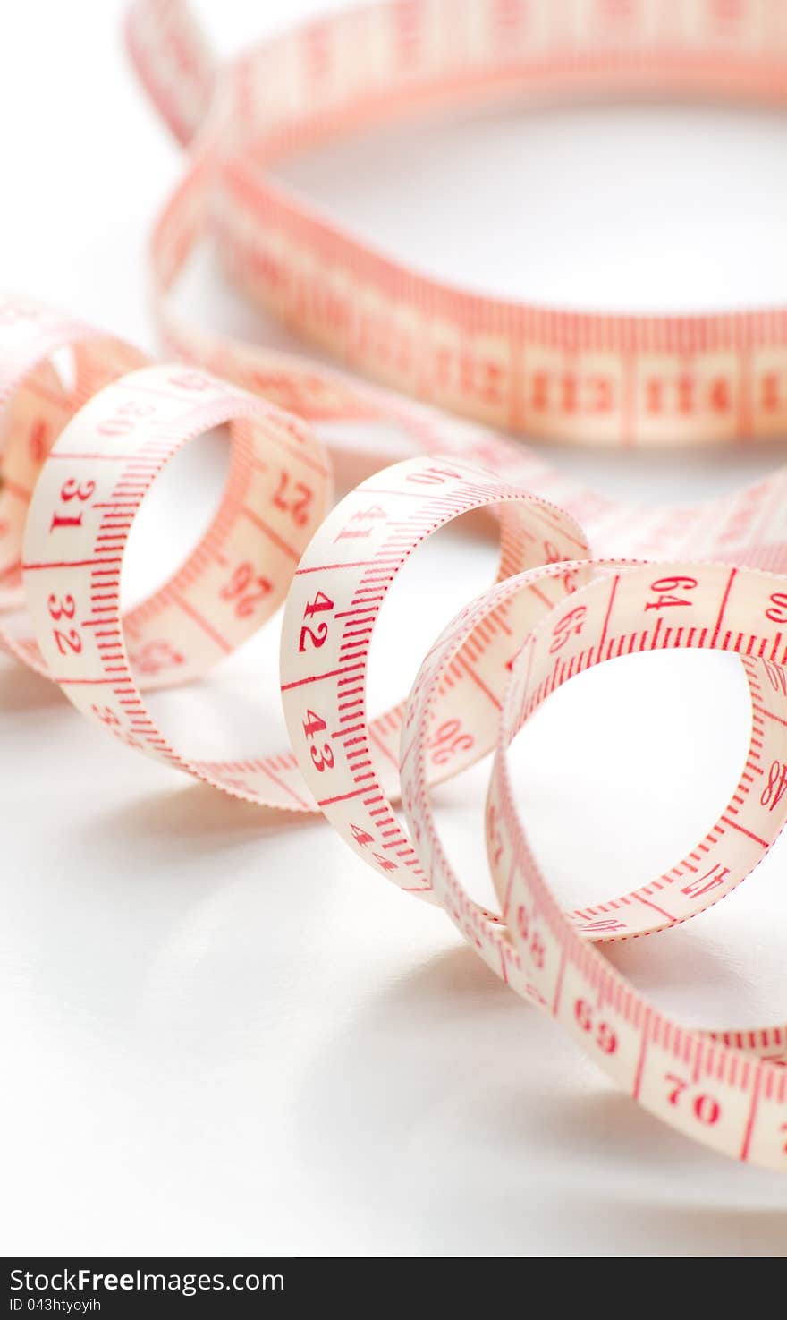 Measurement tape on a white background