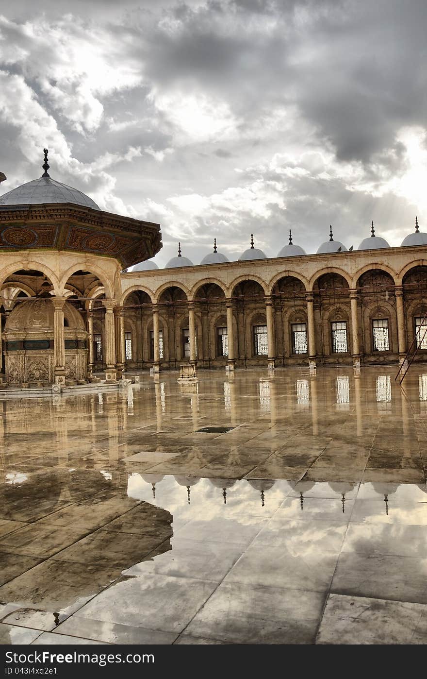 Mohamed aly Mosque , Sultan Hasan&#x27;s low profile seems inconsistent with the massive undertaking that was his mosque, but the mosque&#x27;s grandeur makes sense given Sultan Hasan&#x27;s dramatic life. Sultan Hasan ascended the throne at the age of 13 in 748 AH/1347 CE.[2] When he reached maturity in 1350, he arrested the Emir Manjaq who controlled all of the state&#x27;s affairs. Prior to that arrest, the emir was restricted to an allowance of just one hundred dirham per day. This pocket change was collected by servants for the Sultan. It&#x27;s especially striking considering that during that time, the emir Shaykhu was estimated to have an income of 200,000 dirham per day. This deprivation may be viewed as a prompt for his later extravagance.