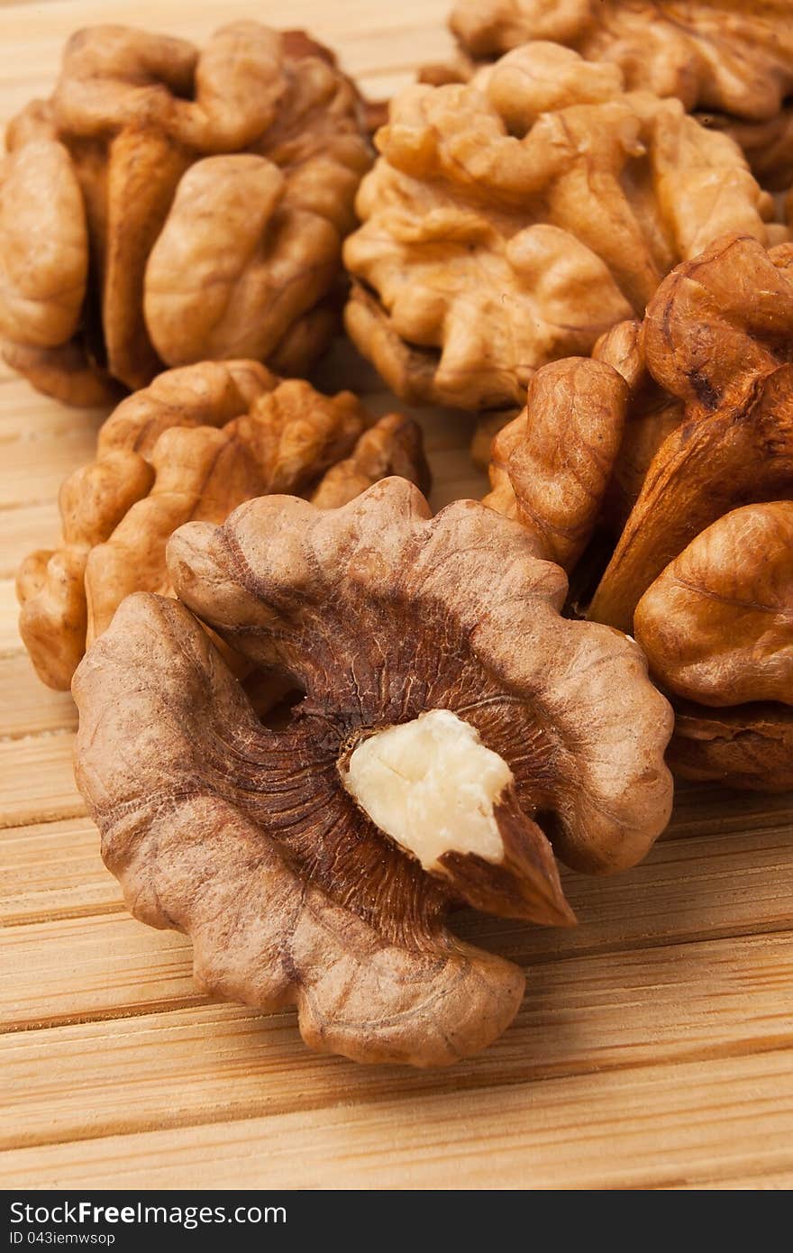 Pile of walnuts on a wooden napkin