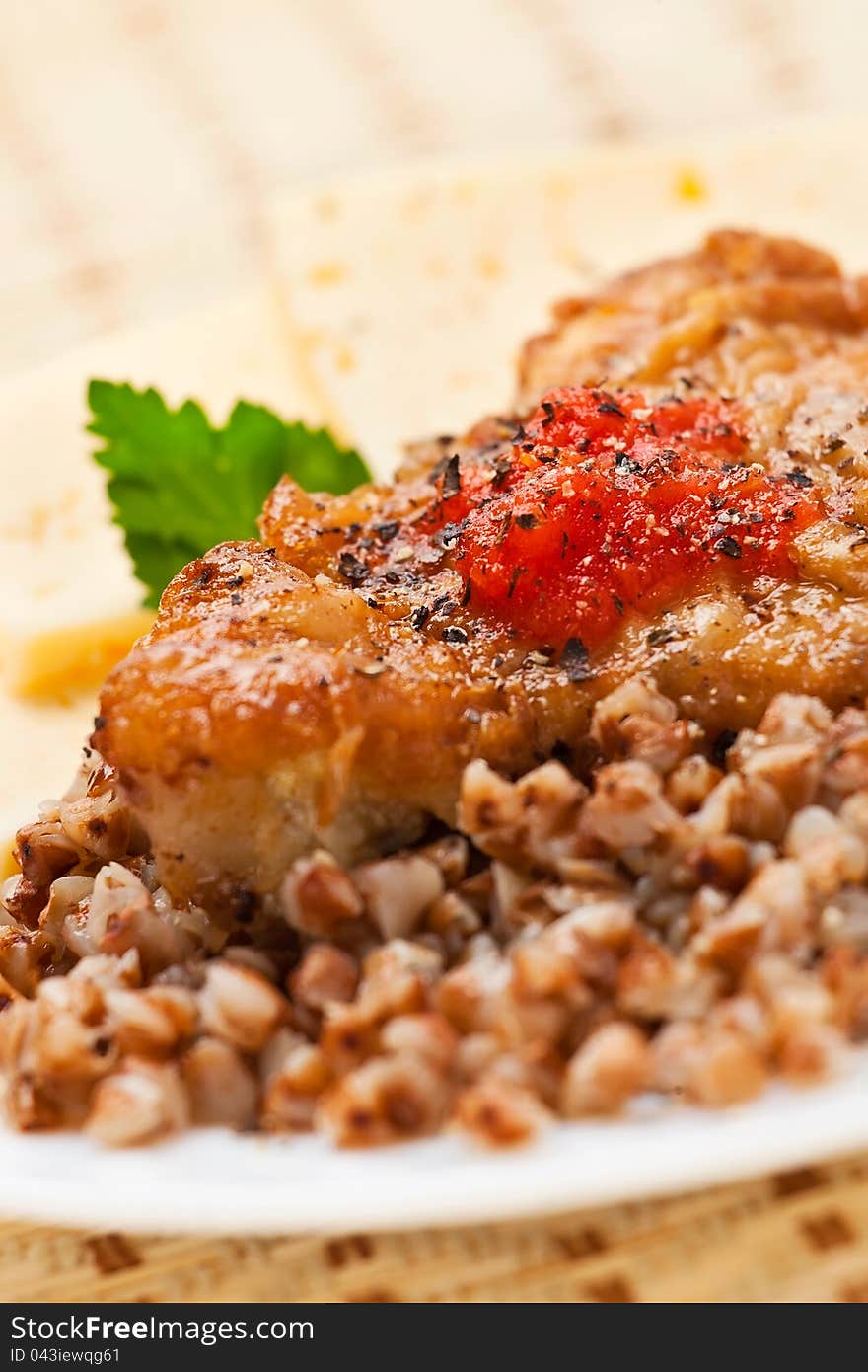 Meat in batter on buckwheat