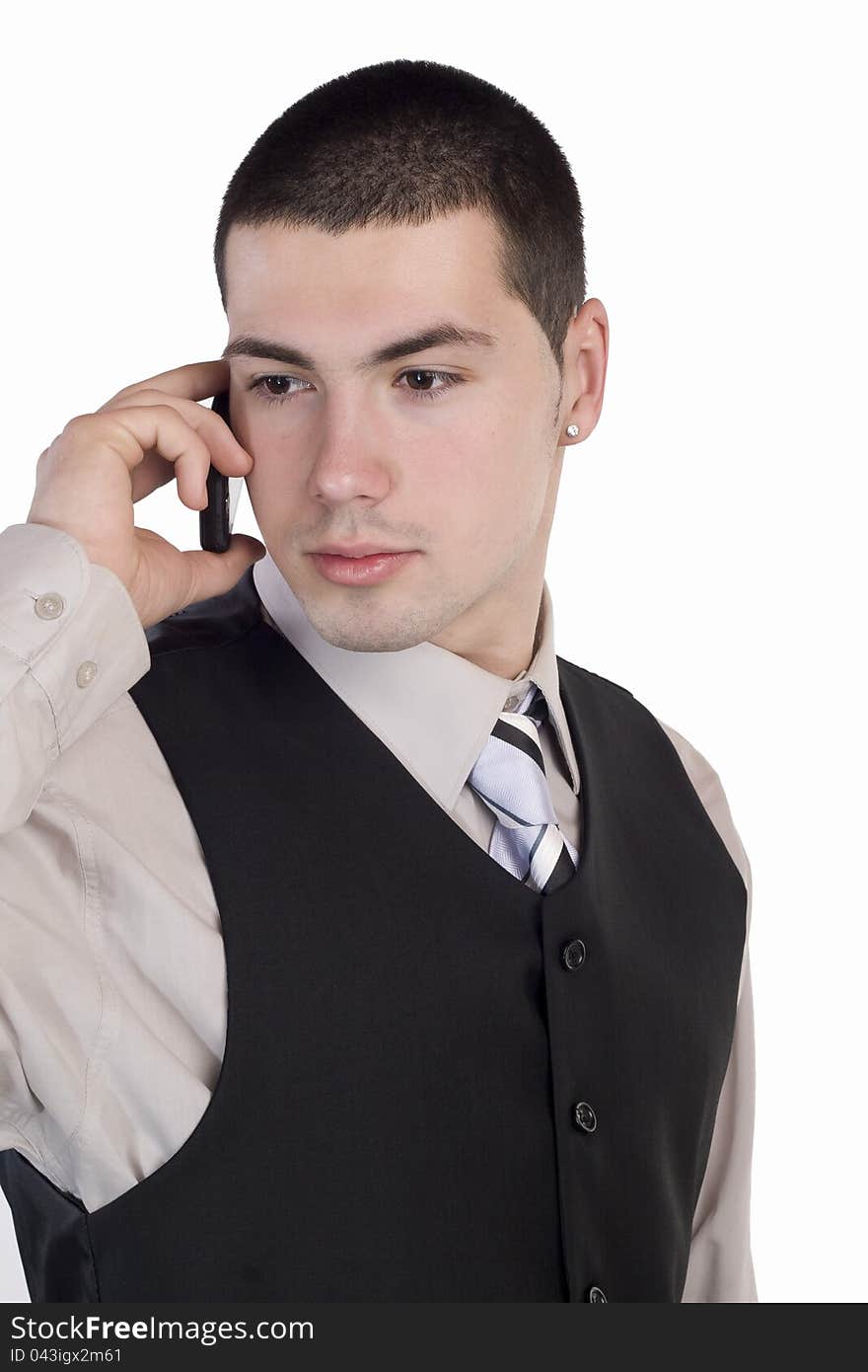 Businessman talking at cellphone, isolated over a white background. Businessman talking at cellphone, isolated over a white background