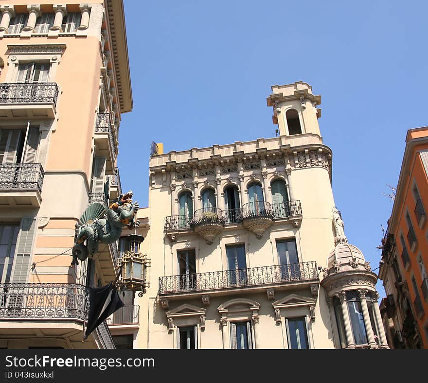 Dragon and umbrella in Ramblas street, Barcelona, Spain