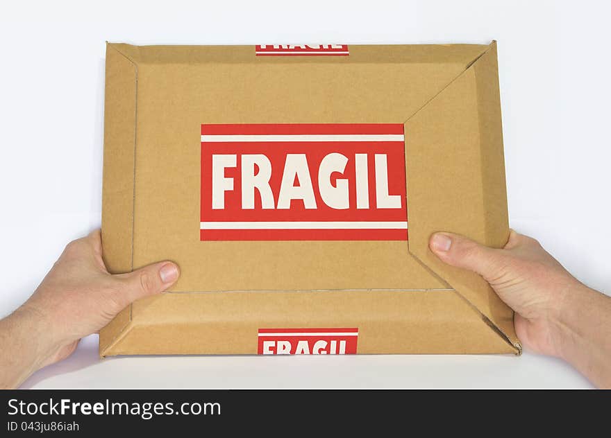 A Cardboard Box Marked Fragile. A Cardboard Box Marked Fragile