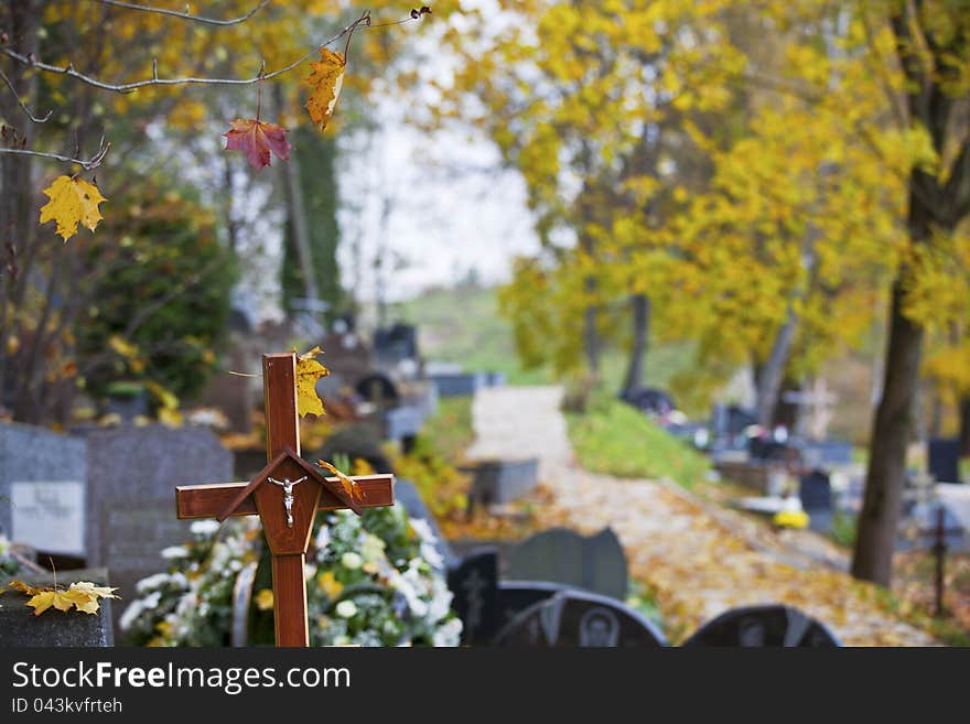 Wooden cross on Christian cemetery