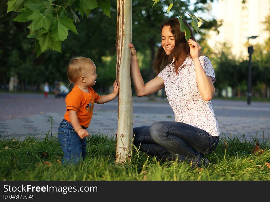 Mother and son playing and smiling each other