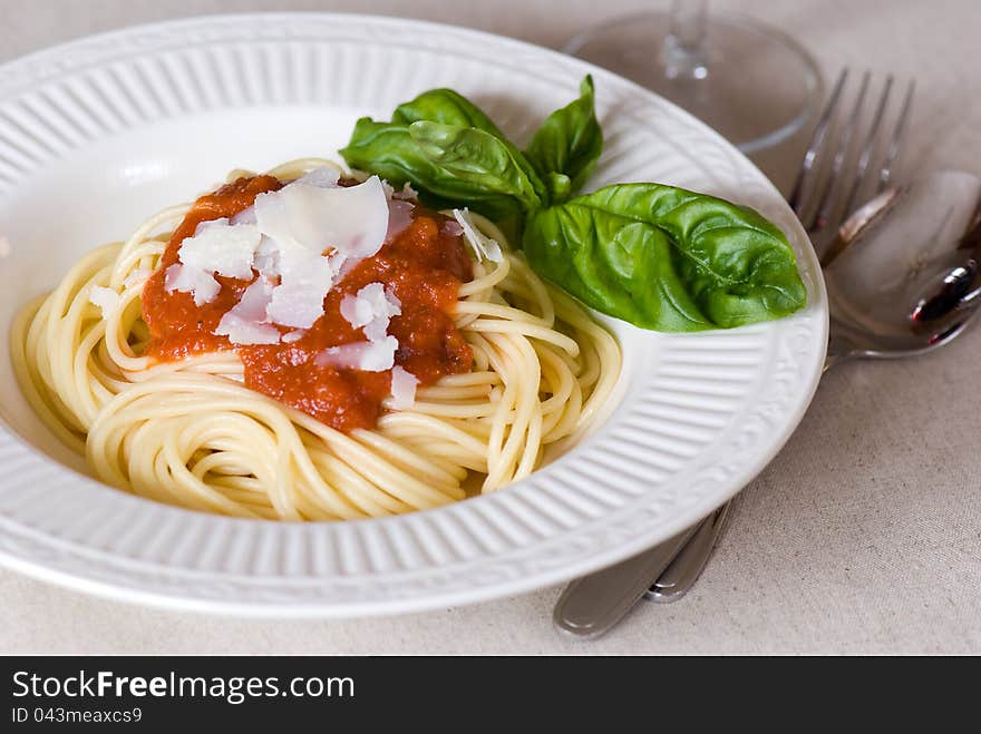 Italian pasta with marinara sause and Parmesan cheese. Italian pasta with marinara sause and Parmesan cheese