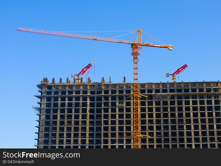 Construction site with crane and building