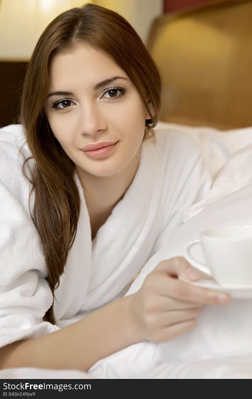 Portrait of a beautiful adult sensuality woman drink coffee. Portrait of a beautiful adult sensuality woman drink coffee