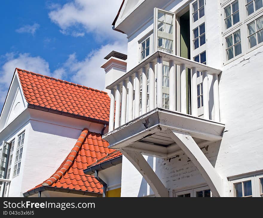 Details of a small wooden balcony in a traditional house Denmark