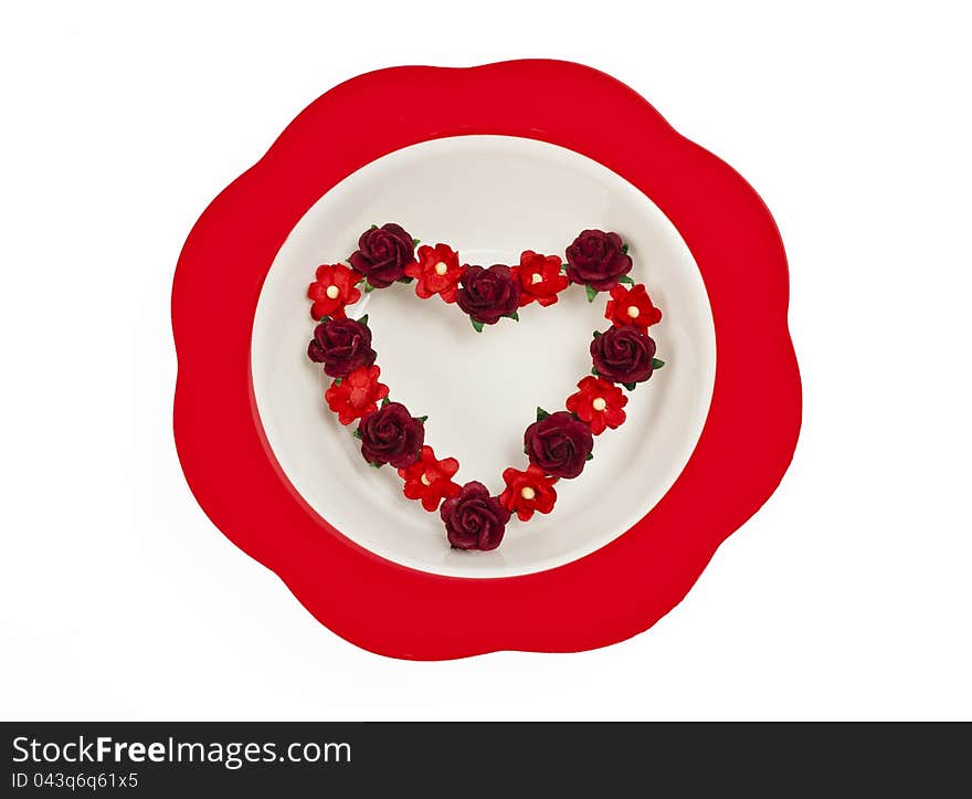 Flower heart symbol in red bowl