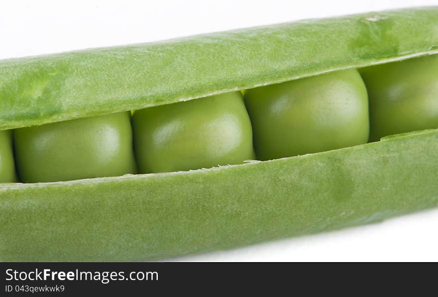 Green peas are photographed close-up. Green peas are photographed close-up