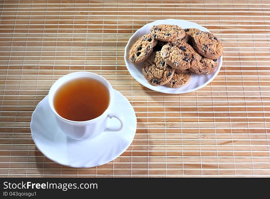 Cup of tea and cookies on the saucer