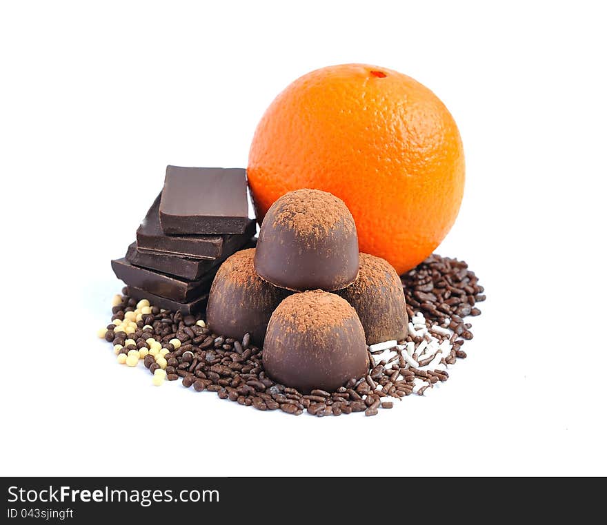 Chocolate Candy, Chocolate And Orange On A White B