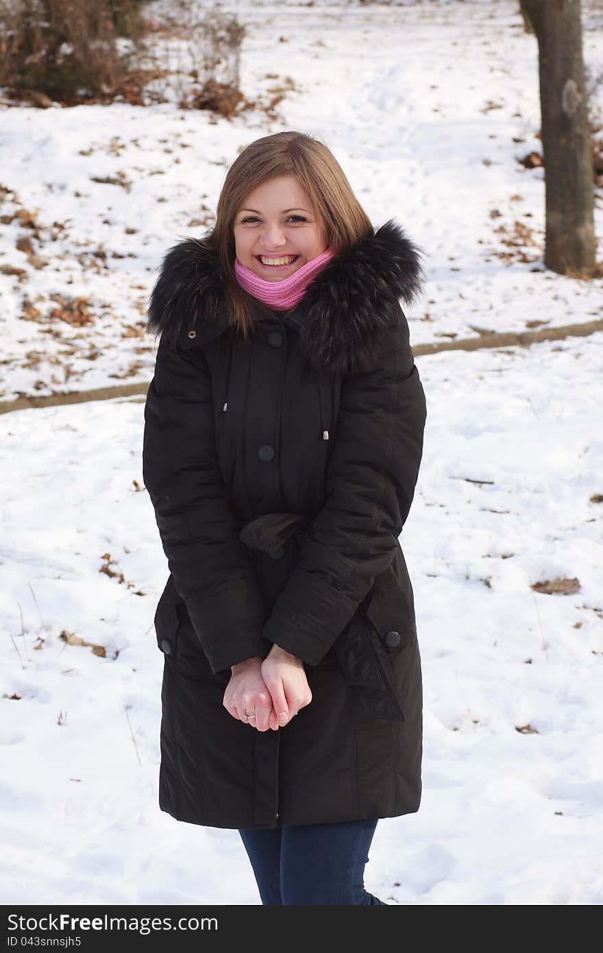 Cute girl in the park in winter. Cute girl in the park in winter