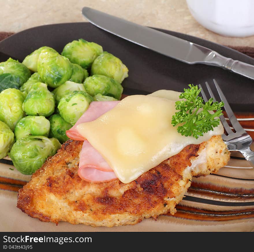 Stacked chicken cordon bleu with brussels sprouts. Stacked chicken cordon bleu with brussels sprouts