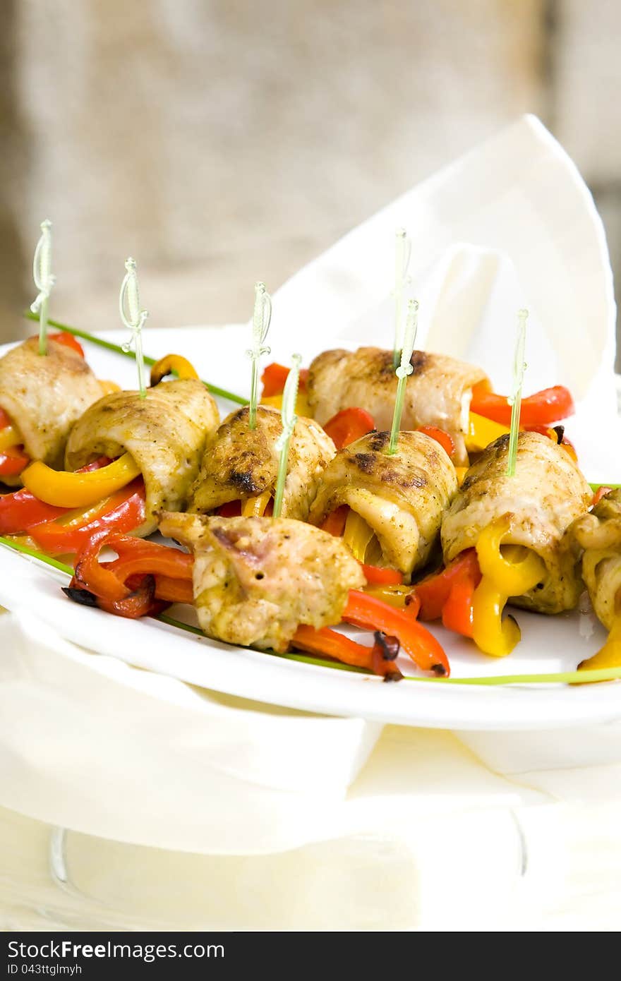 Roll Meat With Yellow And Red Peppers