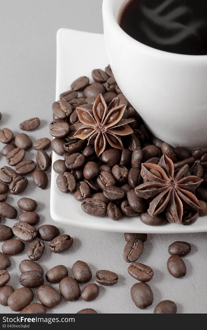 Coffee, Grains, Anise On A Grey Background