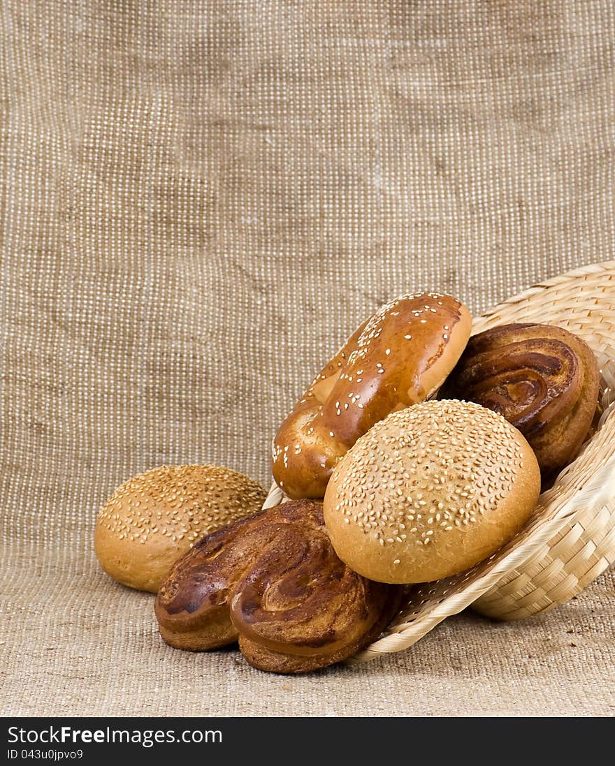 Panary rolls pour out from a basket