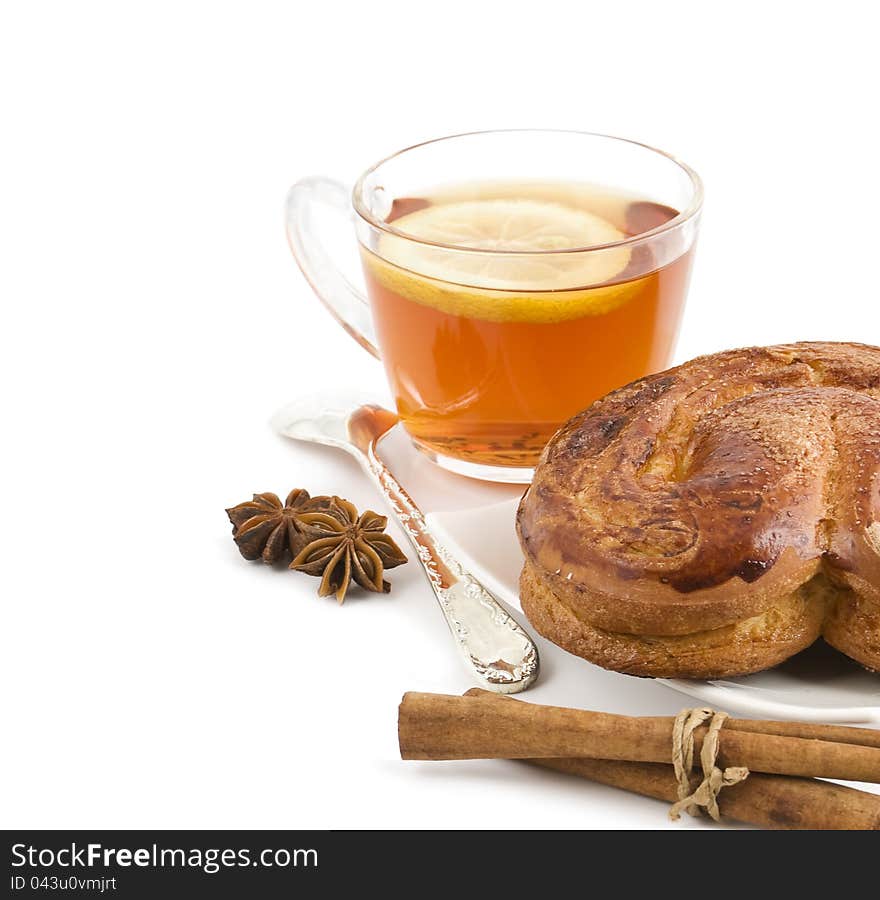 Tea With A Lemon, Roll,  Anise And Tea Spoon