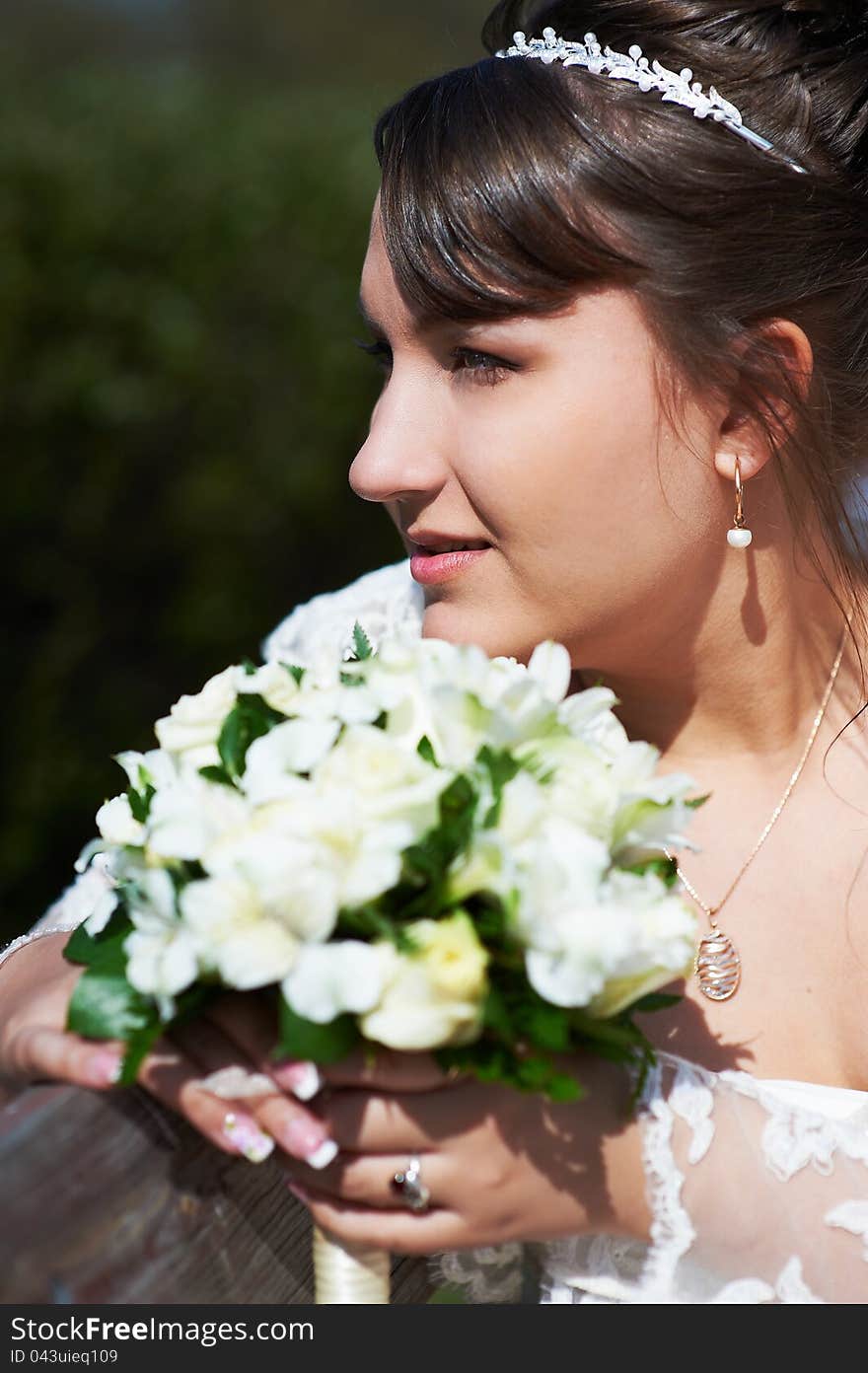 Happy bride with flowers