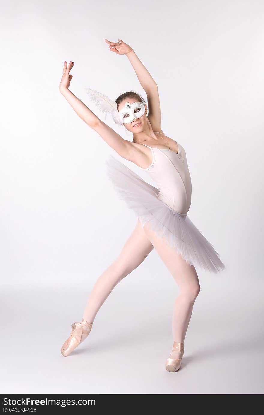 Ballerina in a white skirt