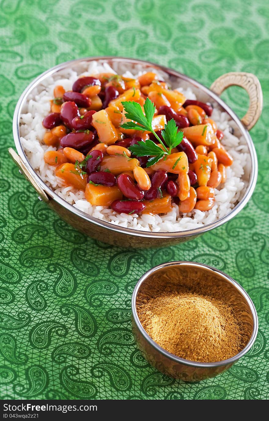 Beans and pineapples in curry sauce and rice, selective focus. Beans and pineapples in curry sauce and rice, selective focus