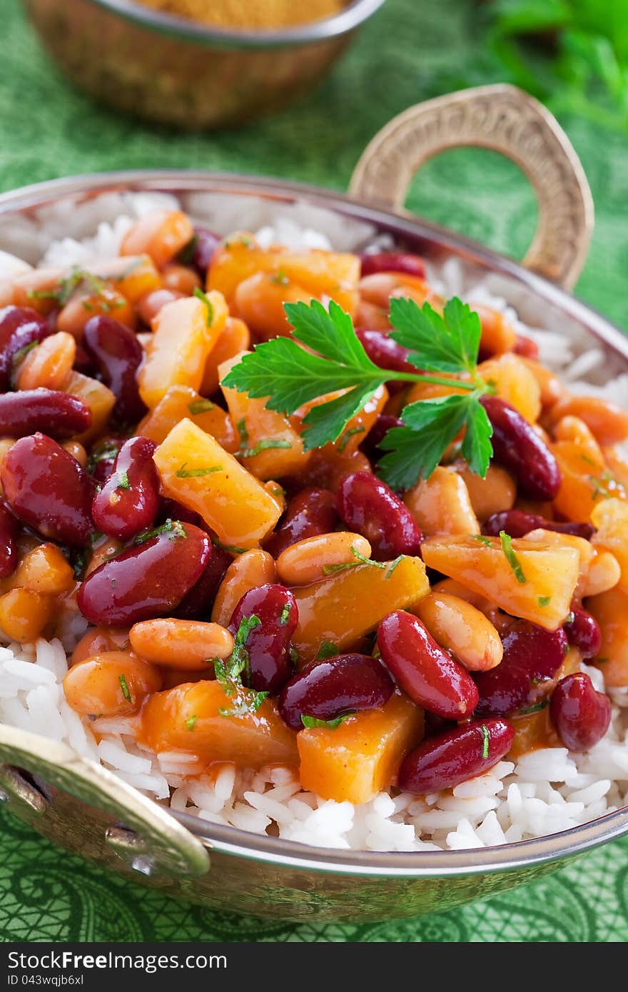 Beans and pineapples in curry sauce and rice, selective focus. Beans and pineapples in curry sauce and rice, selective focus