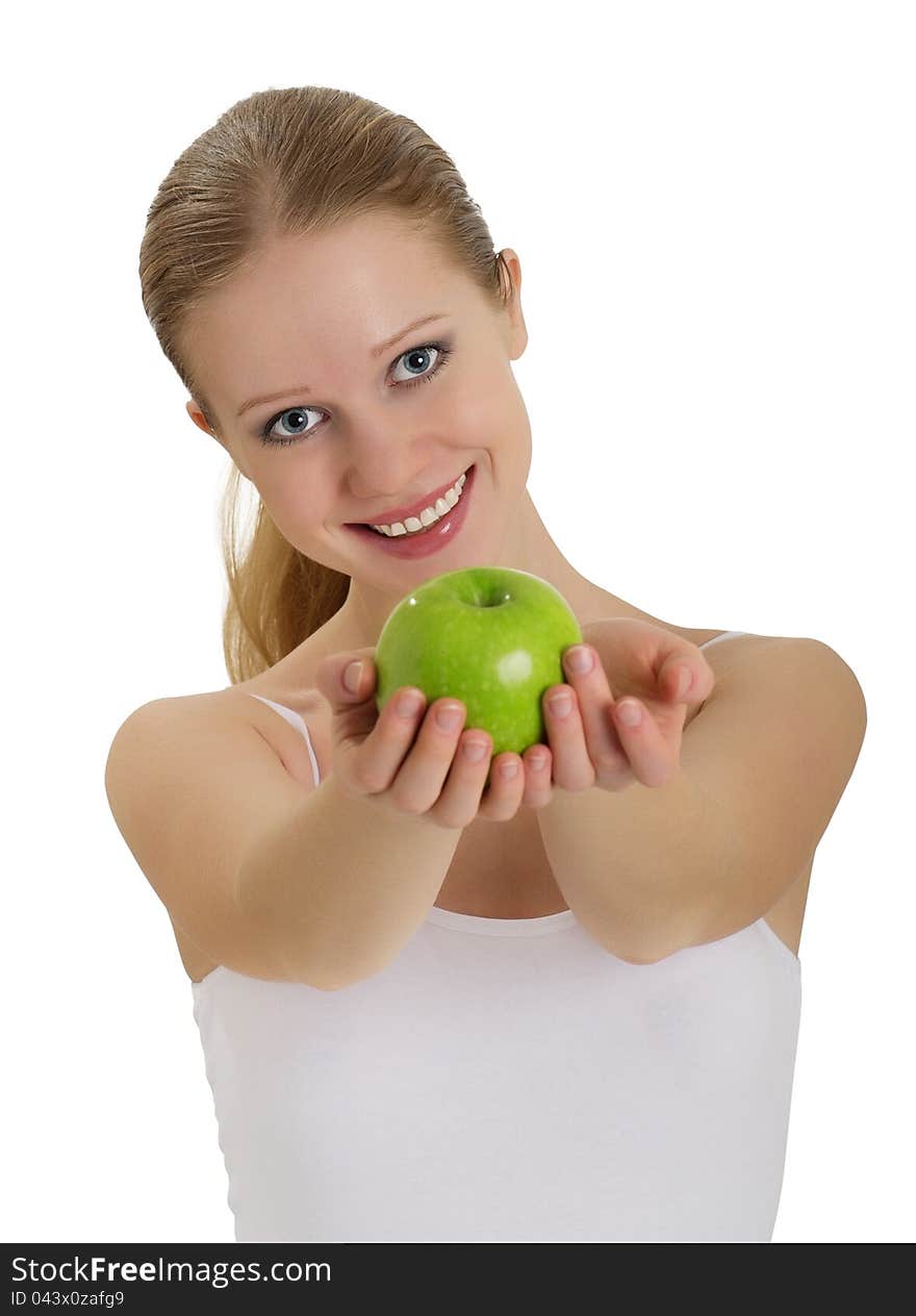 Beautiful young woman holding a ripe apple isolated on white background. Beautiful young woman holding a ripe apple isolated on white background