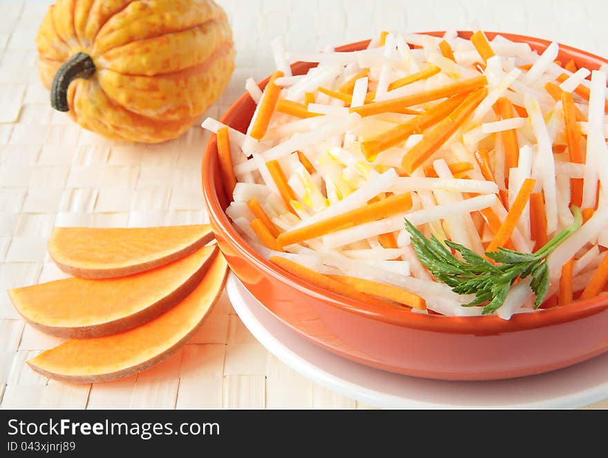 Salad of white radish with pumpkin